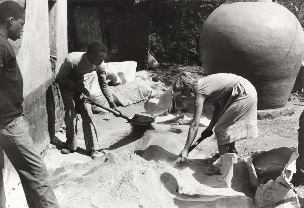 Teenagers mix cement in Kenya, 1983 ref. D/EX2047/3/9