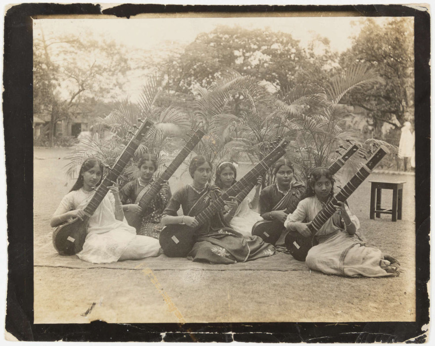 Girls sitting on the floor with sitars in India ref. D/EX1675/31/5/18