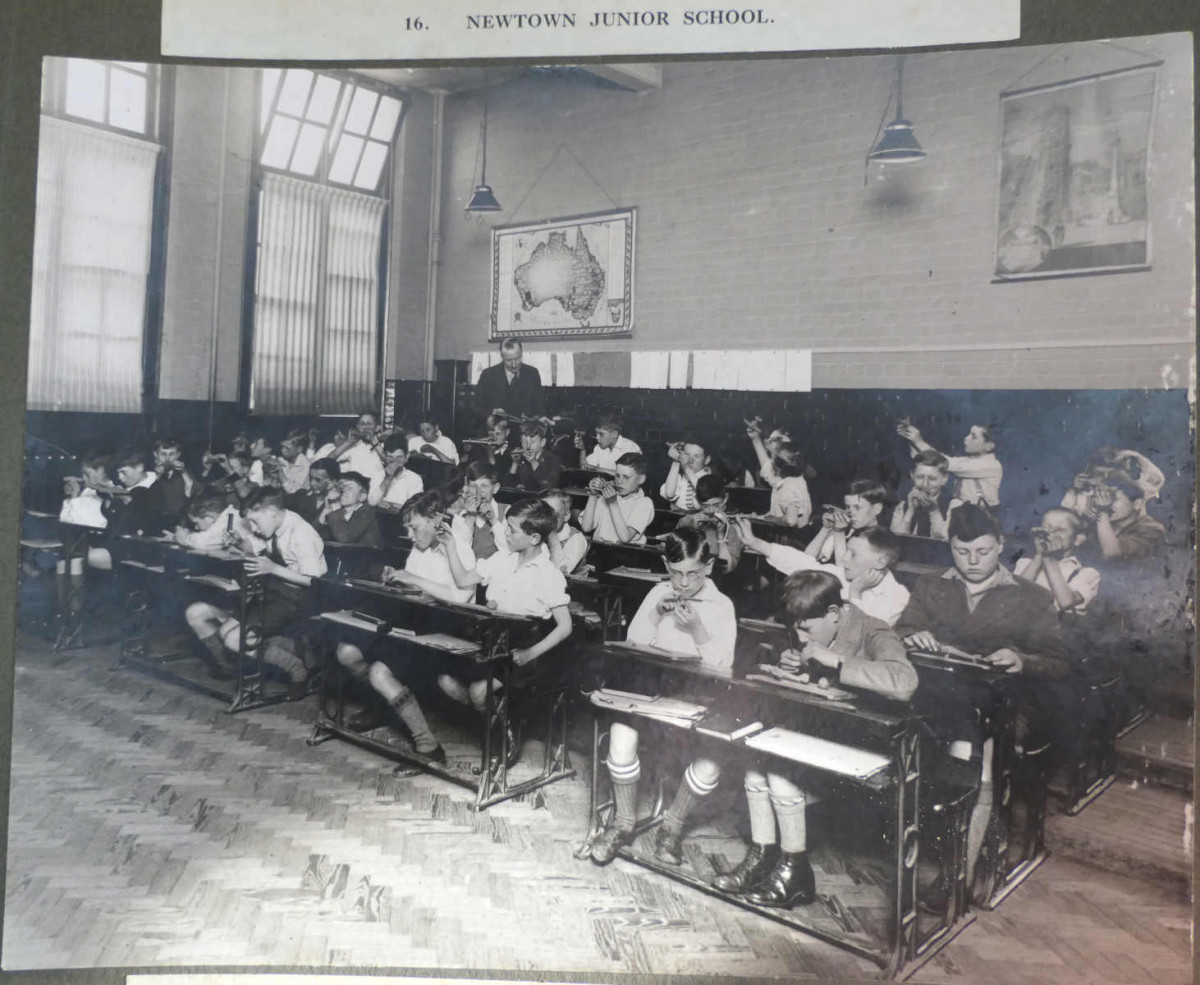 Boys sit in a classroom making model plane4, 1934 ref. 89/SCH/2/26