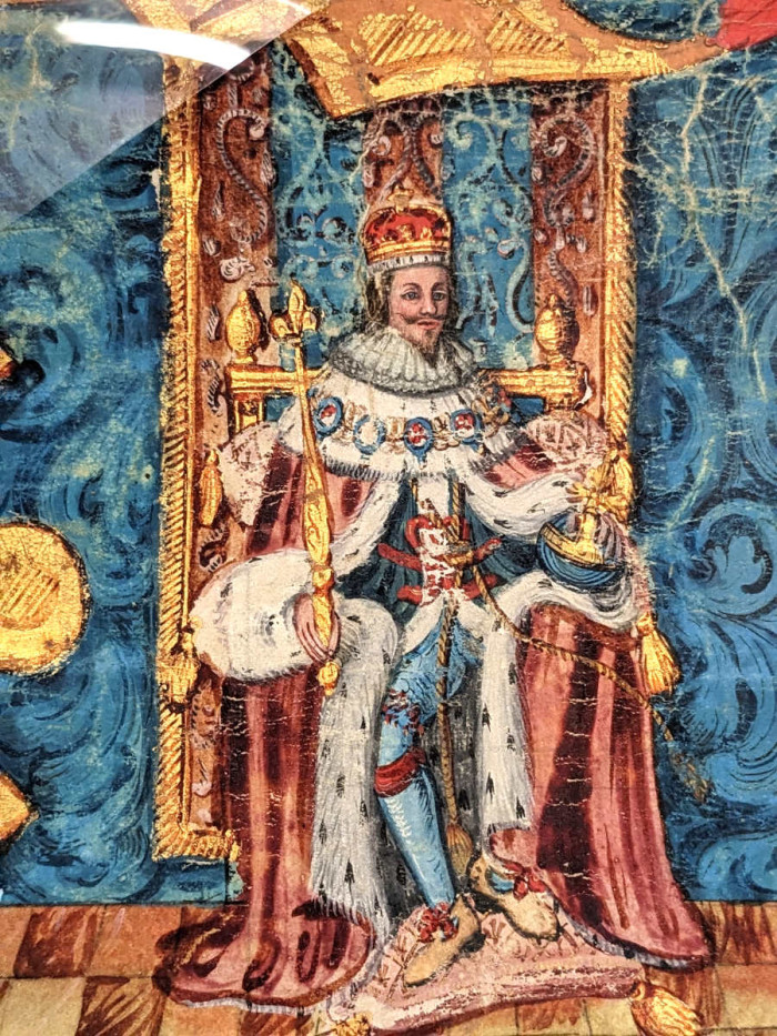 Close up of Charles I drawing from Reading Charter 1638. He is sat on a throne wearing a crown, robe and holding orb and sceptre. reference R/IC1/10