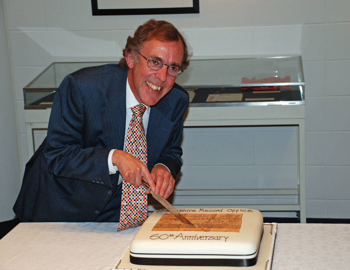 Peter Durrant MBE County Archivist of the Royal Berkshire Archive 1988 to 2014 cutting the celebratory cake for the 60th Anniversary in 2008.